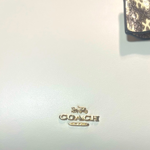 Coach Handbags - Coach snake skin Cream and Gold Logo Handbag brand new